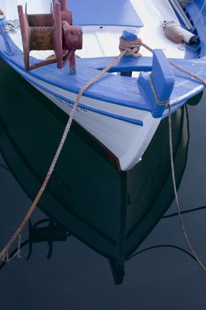 Bow of typical colorful greek fishing boatの写真素材