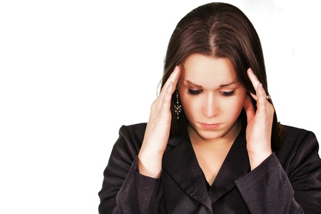 Business woman on white background with headacheの写真素材