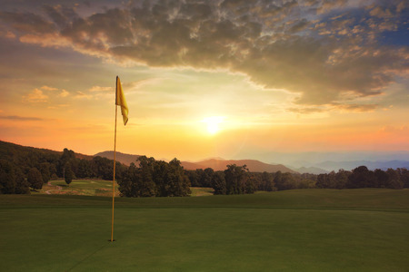 Beautiful sunrise on the golf course with colorful clouds.の写真素材