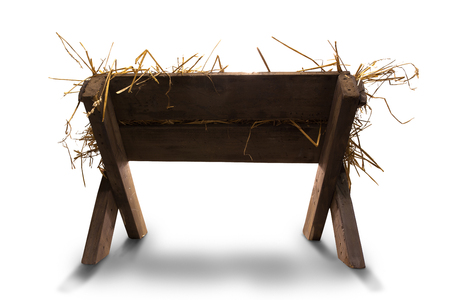 Manger with straw on whie backgroundの写真素材