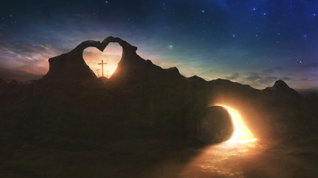 Three crosses and an empty grave on Easter morning with a heart shape in the rocksの写真素材