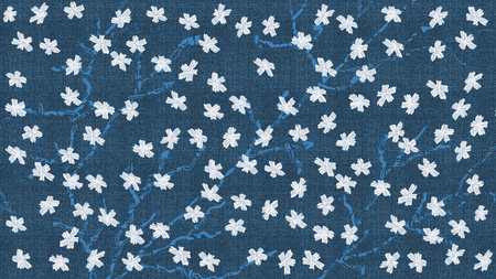 Seamless floral pattern with white flowers on blue linen fabric backgroundの写真素材