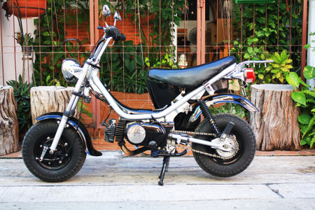 Motorcycle parked on the street in the city of Bangkok, Thailand.の写真素材