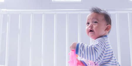 Children toddlers girls play toys at home, kindergarten or nursery.