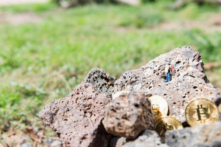 Cryptocurrency concept with bitcoins in bitcoin mine.の写真素材