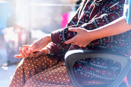 mature woman in nursing home The elderly are assisted by the hospital personnel nurses, senior...