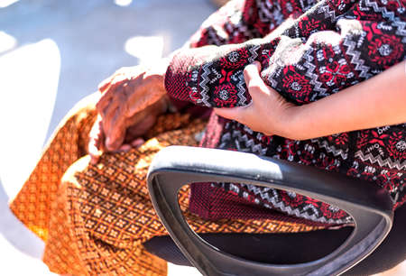 mature woman in nursing home The elderly are assisted by the hospital personnel nurses, senior...