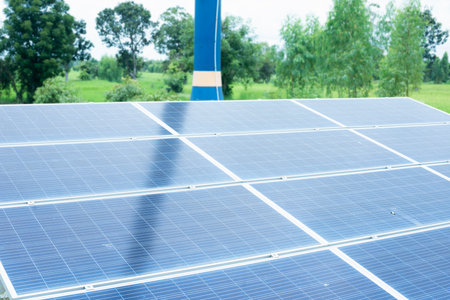 solar panel The background is an agricultural rice field.の写真素材