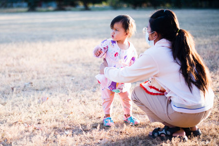 Mother and Daughter Enjoying Sport Activity Outdoors.の写真素材