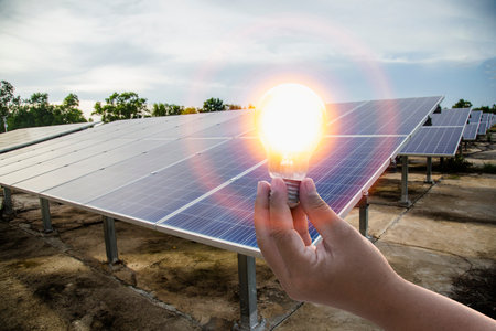 Hand writing concept showing solar energy The business image shows the radiation from the sun that can produce heat or electricity.の写真素材