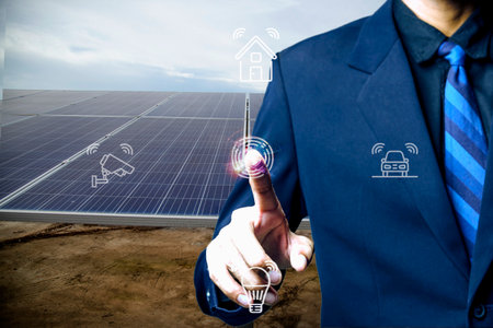 A man tracks energy production from a solar power plant with a mobile phone. Close-up of a phone...