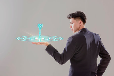 Targeting business concept. Businessman hold virtual target icons for business objective. Strategic planning for business growth and target customer group. set up business objective target goal.の写真素材