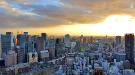 Osaka  Jan 2016: Bird eye view at the top of Umeda sky building during sunset in winter on 16 January 2016 in Osaka, Japanのeditorial素材