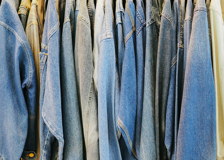 Jeans jecket hanging on Hangerの写真素材