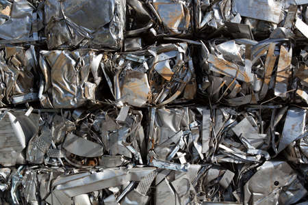 Compressed packages blocks scrap of metal stripsの写真素材