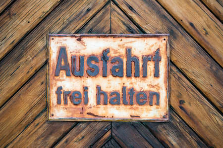 EXIT free German Sign on Timber Backgroundの写真素材