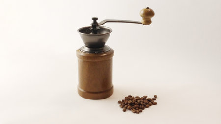 Wooden coffee mill and coffee beansの写真素材