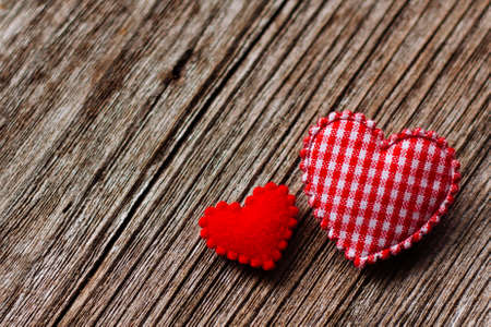 Red heart on wooden background.の写真素材
