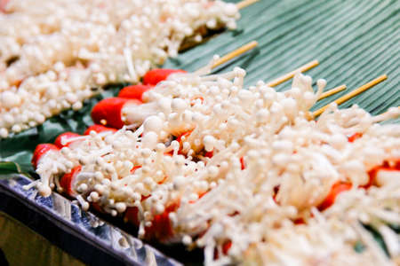 Grilled Enoki Mushroom Wrapped with Slice of Crab Sticks