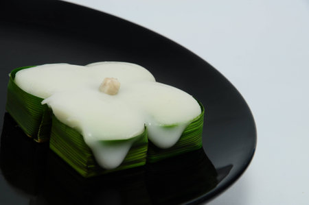 Thai pudding with coconut toppingの写真素材