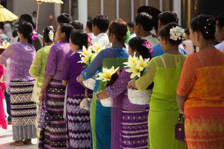 Mahamuni Temple Mandalay Myanmar 12/12/2015 ceremony with girls dressed in whiteのeditorial素材