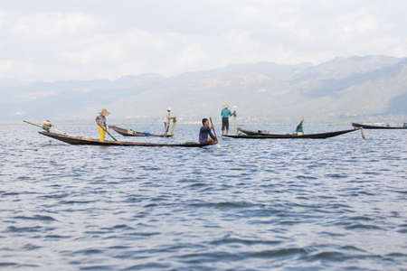 Inle Lake, Myanmar 12/16/2015 traditional Intha fisherman rowing with one legのeditorial素材