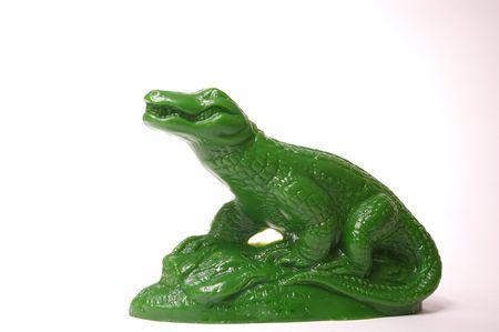 Green plastic alligator statueの写真素材