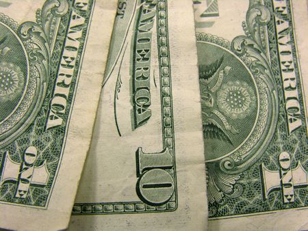 Macro photo of three USA currency notes.
