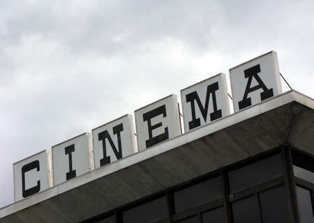 Sign atop a movie theaterの写真素材