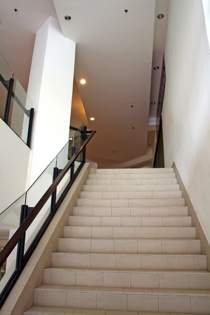 Modern glass and steel staircase bright airy 