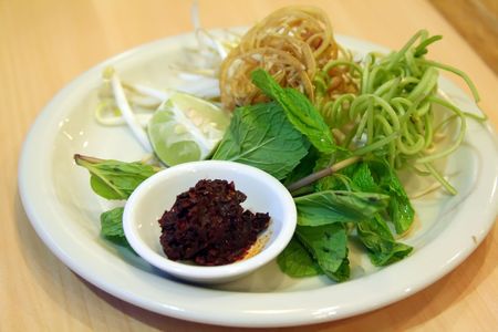 Traditional vietnamse accompaniement of raw vegetables and herbs