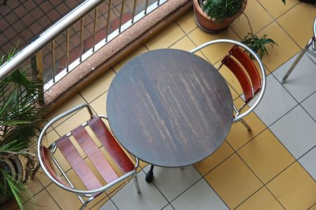 Top down view of cafe bistro table and chairs
