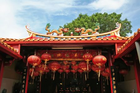 Traditional chinese temple rooftop against blue skyの写真素材