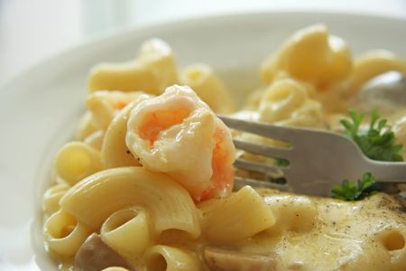 Macaroni and cheese with shrimpの写真素材