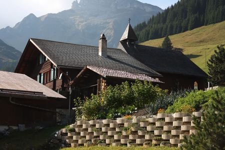 Traditional wooden alpine cabin in the Swiss mountainsの写真素材