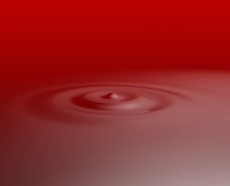 Liquid ripples with circular rings, glossy reflective surfaceの写真素材