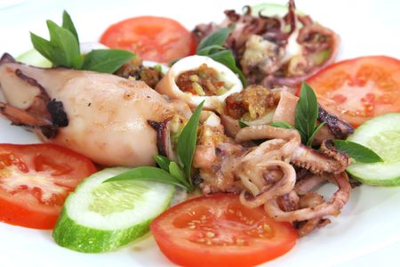 Stuffed squid dish with sticky rice, traditional asian cuisine