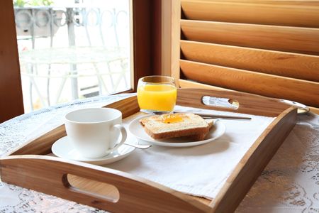 Elegant luxury breakfast with toast coffee and orange juice