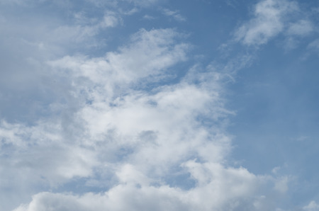 Blue sky with the soft white cloudsの写真素材