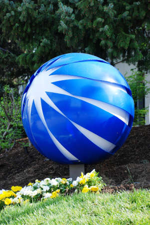 Sphere on a street crossroads. The sphere is the elementary and perfect  figure, capable to serve as a symbol and an ornament.の写真素材