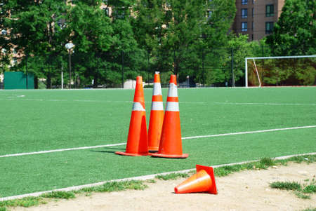 Repair is planned. Repair signs near a football field.の写真素材