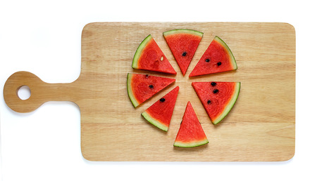 water melon slice on wood plate isolated on white background