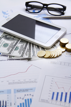 Finance concecpt - money, chart, coin, banknote, keyboard, fin techの写真素材