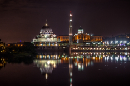 Taken at putrajaya at night with a reflection in waterの写真素材