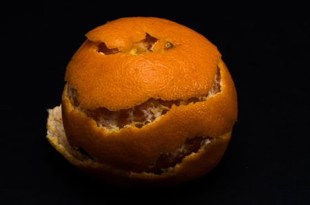 Orange in black background.の写真素材