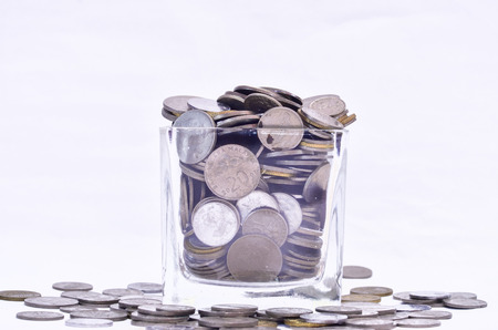 Malaysian Coins In A Glass Containerの写真素材