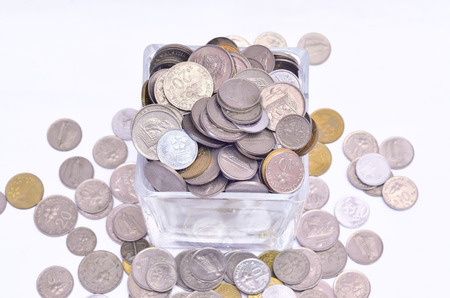 Malaysian Coins In A Glass Containerの写真素材
