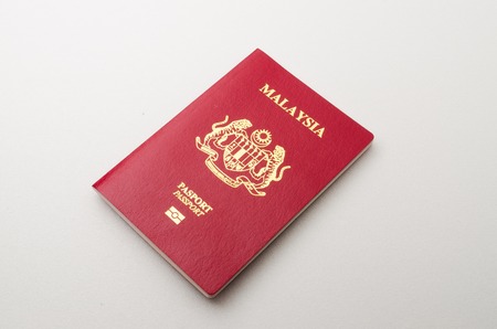 Kedah, Malaysia - February 5, 2015 : Malaysian Passport. Malaysian passport is an international pass to cross over another country. A person with a passport can stay on any country as long as the passport is not expired.のeditorial素材
