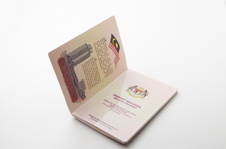 Kedah, Malaysia - February 5, 2015 : Malaysian Passport. Malaysian passport is an international pass to cross over another country. A person with a passport can stay on any country as long as the passport is not expired.のeditorial素材