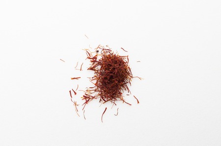 Safron is a valuable herbs mostly found in arabic country. Saffron has many benefits towards health.By mixing a few saffron with hot water, the water will turn color into yellow.の写真素材